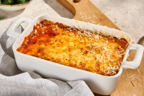 Lasanha de bacalhau gratinada com queijo